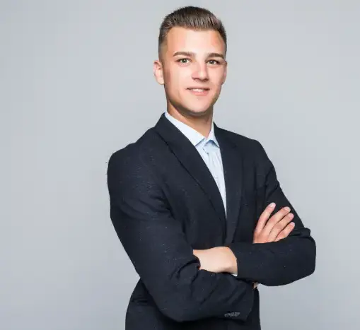 handsome-young-man-student-businessman-jacket-holds-his-arms-crossed-isolated-light-grey-wall handsome-young-man-student-businessman-jacket-holds-his-arms-crossed-isolated-light-grey-wall